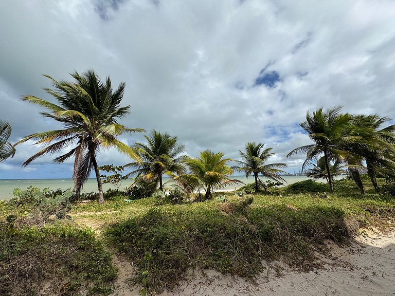 Flat beira-mar pé na areia com varanda AH 410