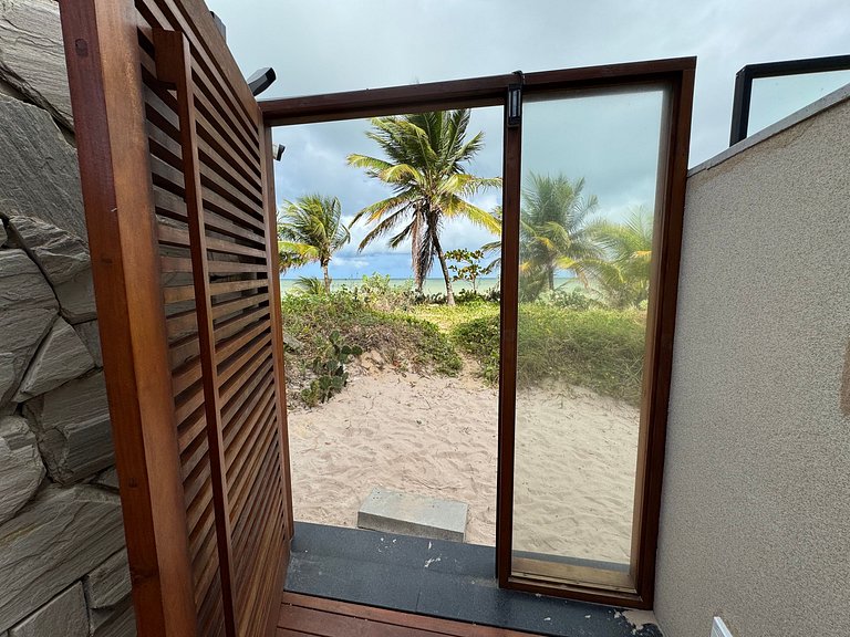 Flat beira-mar pé na areia com varanda AH 409