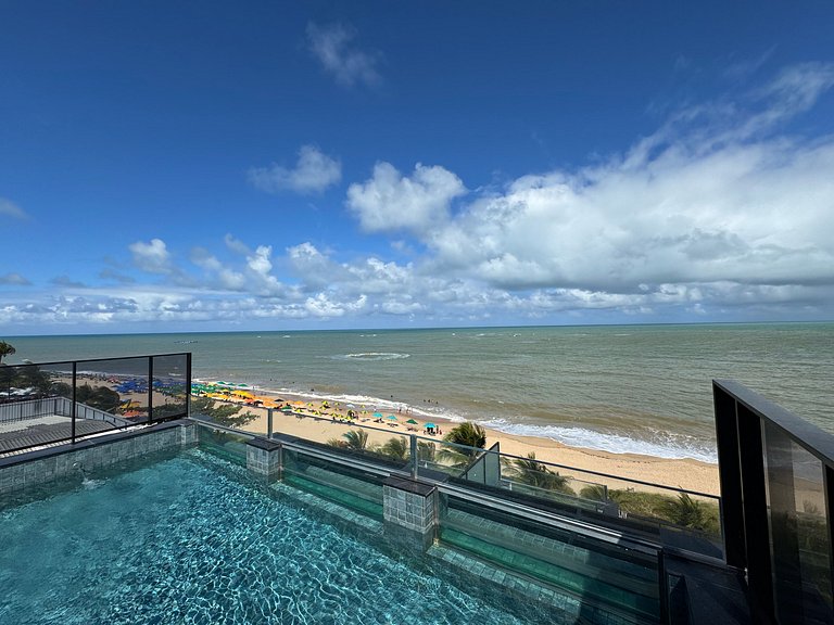 Flat beira-mar pé na areia com varanda AH 409