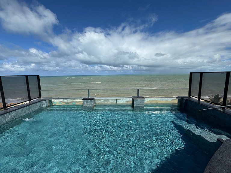 Flat beira-mar pé na areia com varanda AH 409