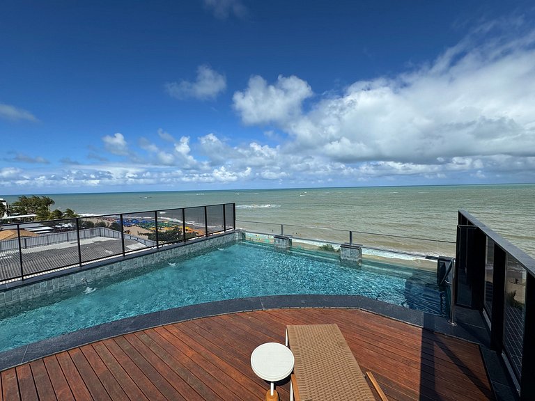 Flat beira-mar pé na areia com varanda AH 409