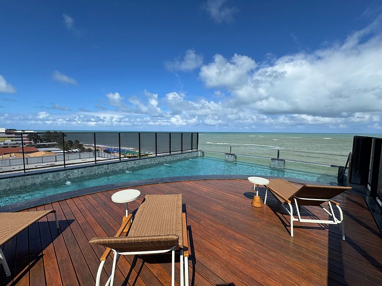 Flat beira-mar pé na areia com varanda AH 409