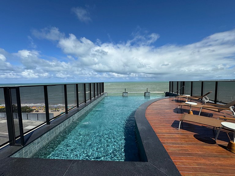 Flat beira-mar pé na areia com varanda AH 409