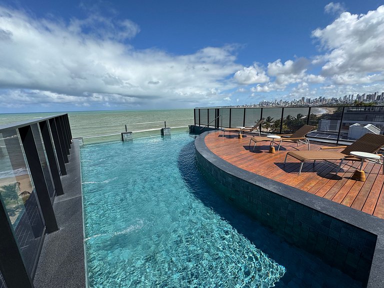 Flat beira-mar pé na areia com varanda AH 409