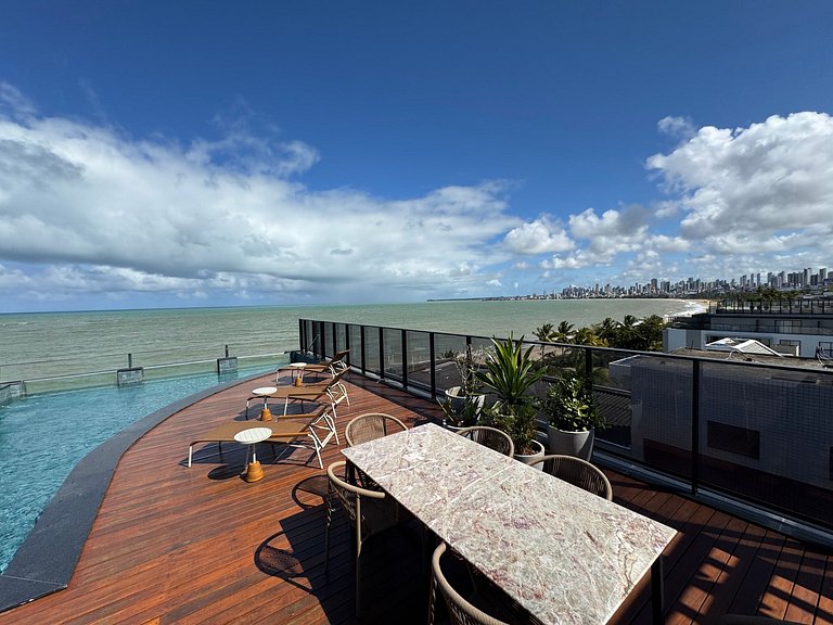 Flat beira-mar pé na areia com varanda AH 409