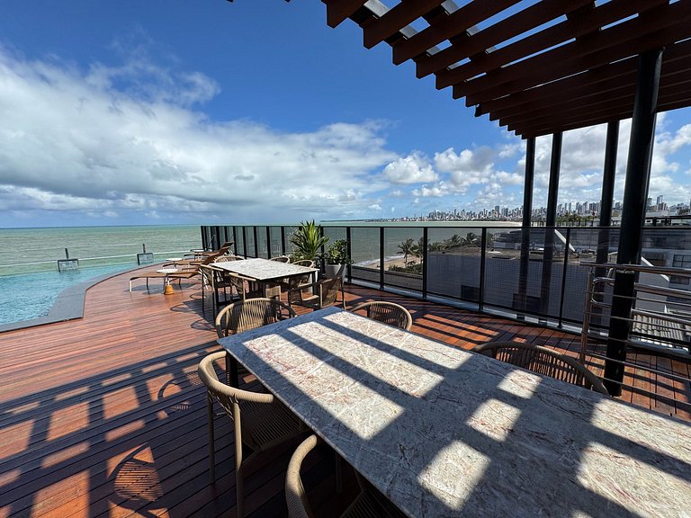 Flat beira-mar pé na areia com varanda AH 409