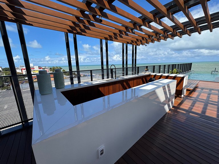 Flat beira-mar pé na areia com varanda AH 409