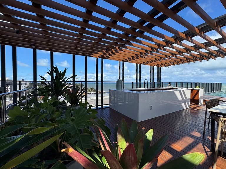 Flat beira-mar pé na areia com varanda AH 409