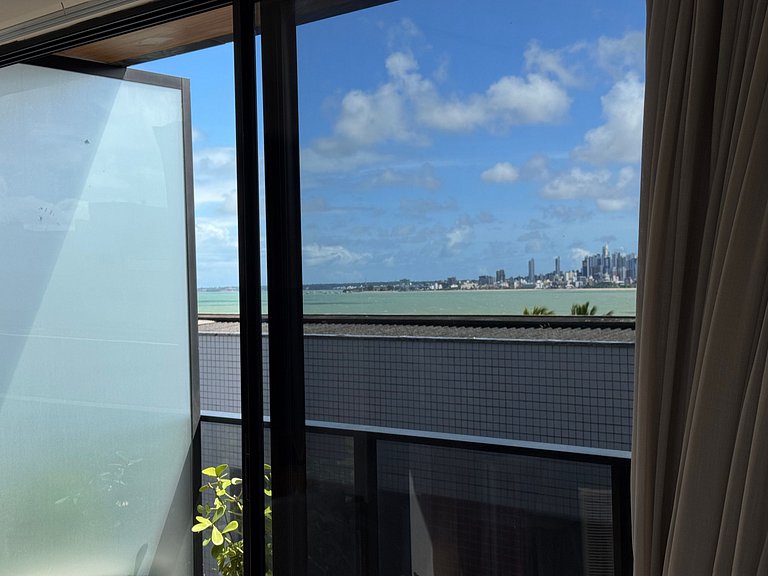 Flat beira-mar pé na areia com varanda AH 409