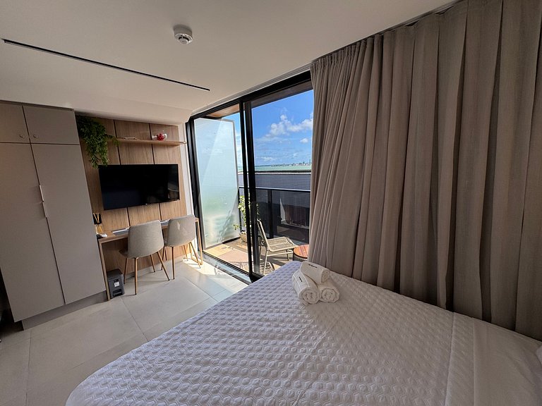 Flat beira-mar pé na areia com varanda AH 409