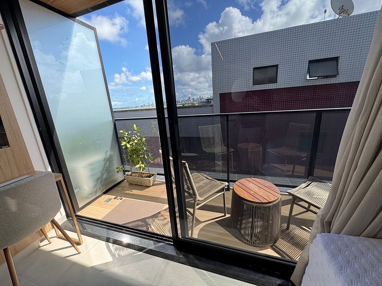 Flat beira-mar pé na areia com varanda AH 409