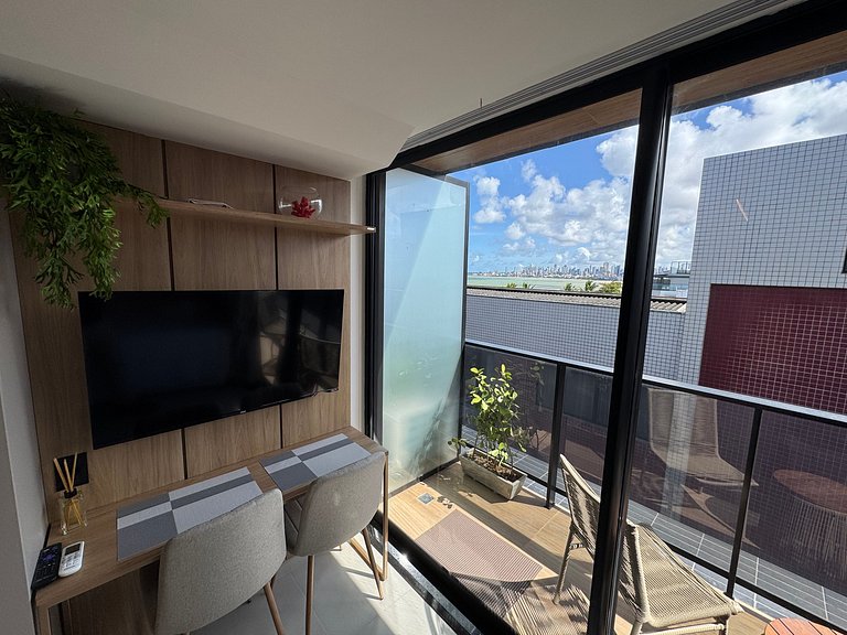 Flat beira-mar pé na areia com varanda AH 409