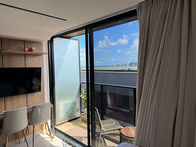 Flat beira-mar pé na areia com varanda AH 409