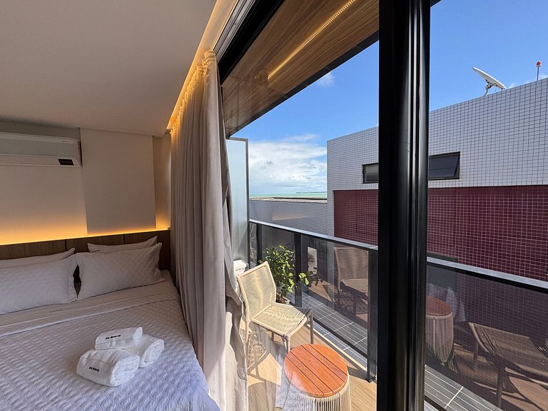 Flat beira-mar pé na areia com varanda AH 410