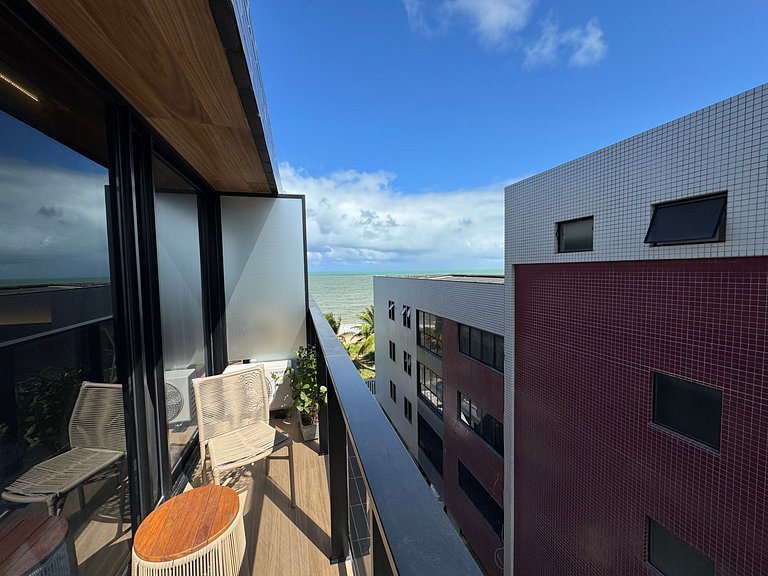 Flat beira-mar pé na areia com varanda AH 410