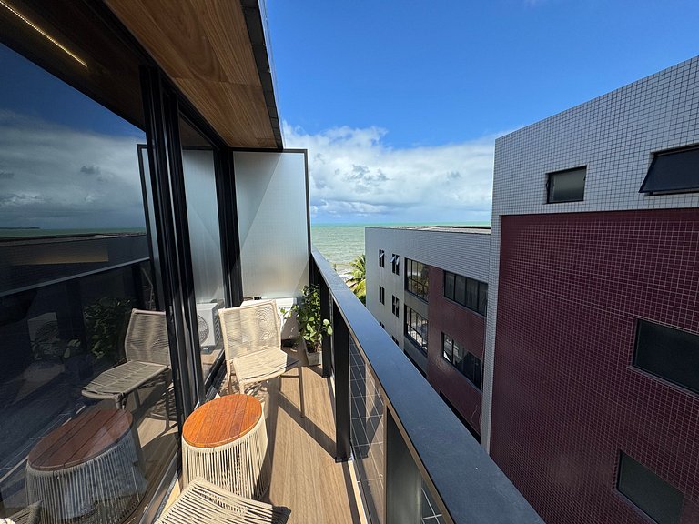 Flat beira-mar pé na areia com varanda AH 410