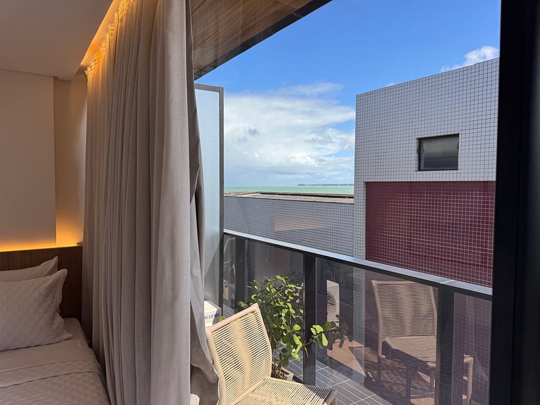 Flat beira-mar pé na areia com varanda AH 410