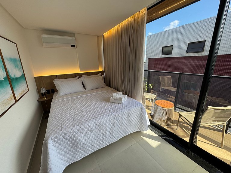 Flat beira-mar pé na areia com varanda AH 410