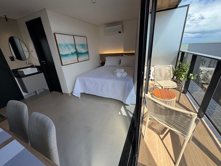 Flat beira-mar pé na areia com varanda AH 410