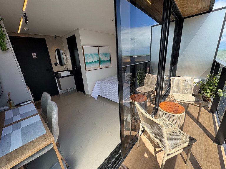 Flat beira-mar pé na areia com varanda AH 410