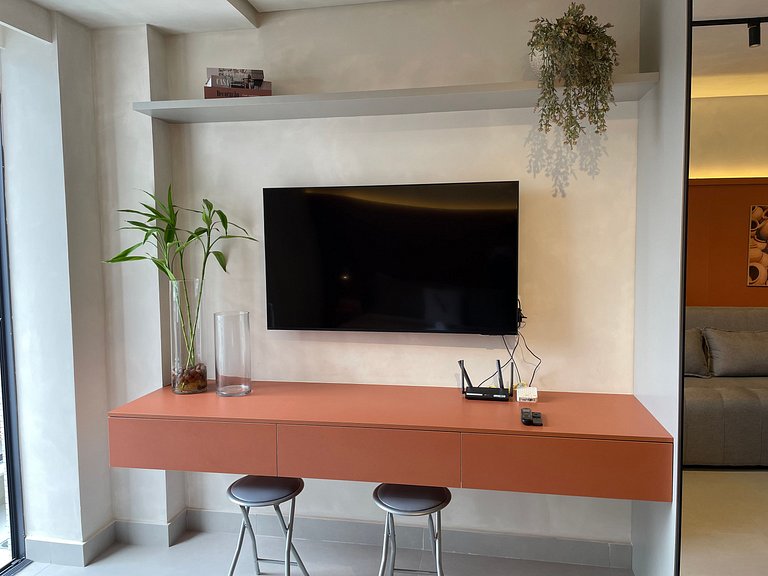 Flat com área de lazer e varanda no Caribessa
