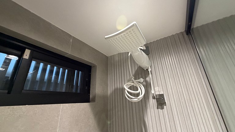 Flat térreo com terraço no Acqua Tambau AQTX3
